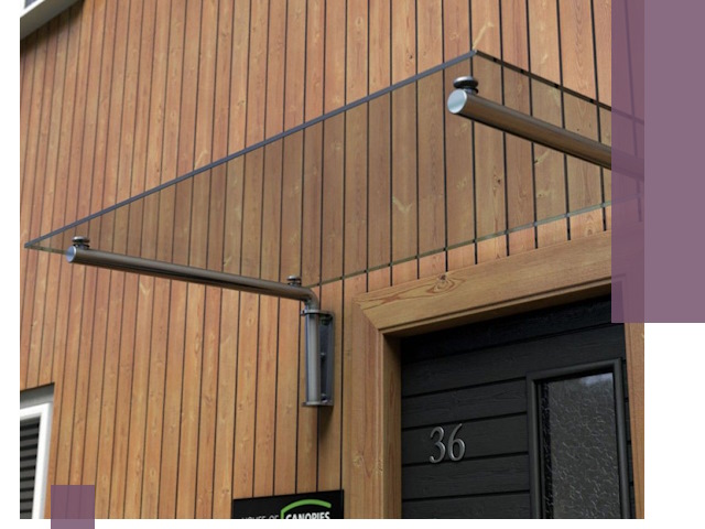 Стеклянные козырьки на входы и фасады в Санкте-Петербурге